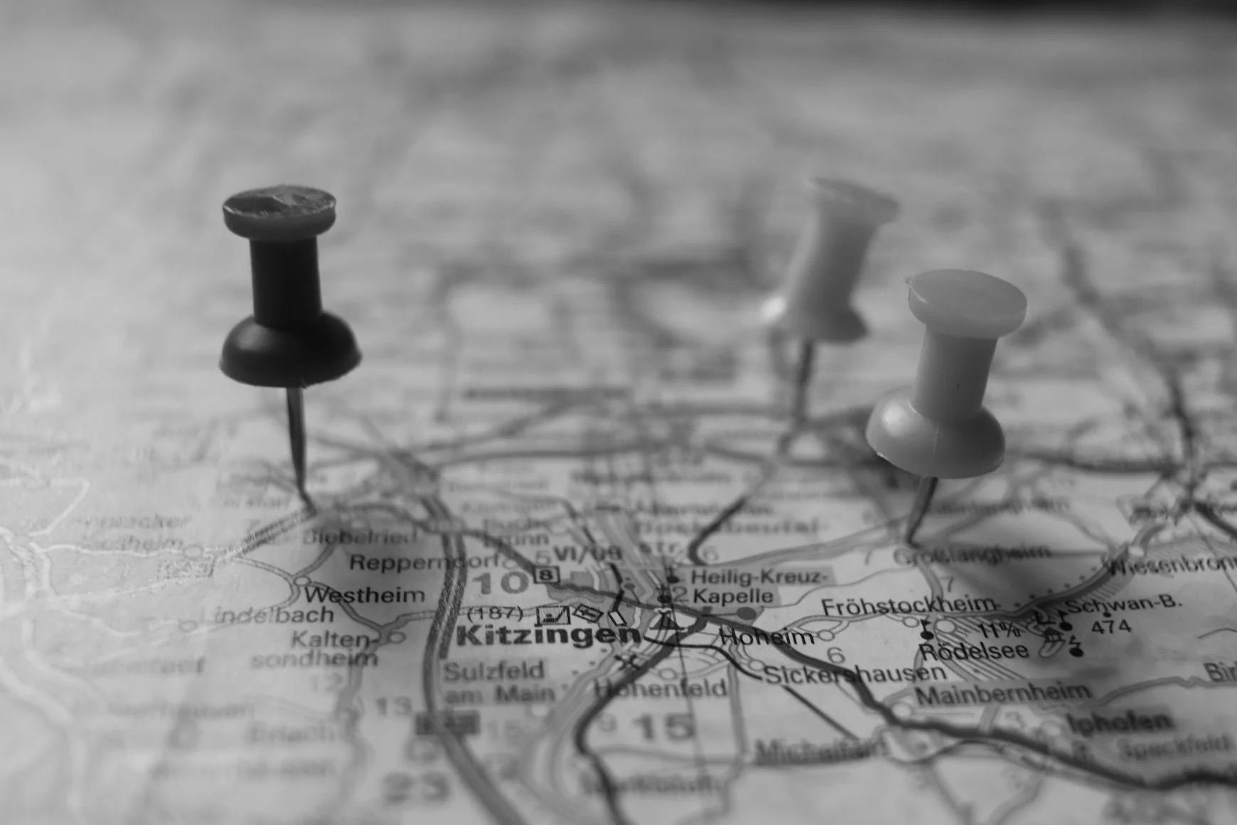 A map with pins on it — Photo by Joachim Schnürle on Unsplash